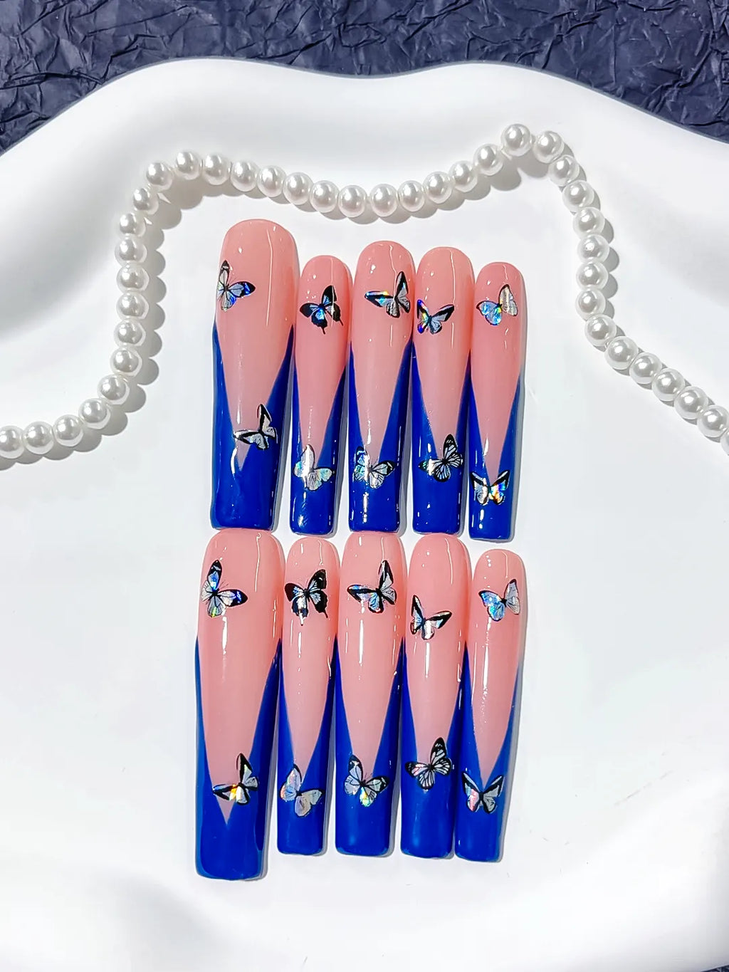 Pink Blue French tip Butterfly press on nails close up