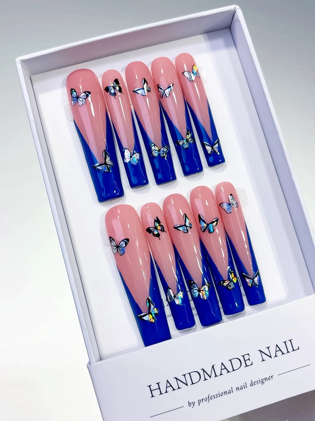 Pink Blue French tip Butterfly press on nails detail view