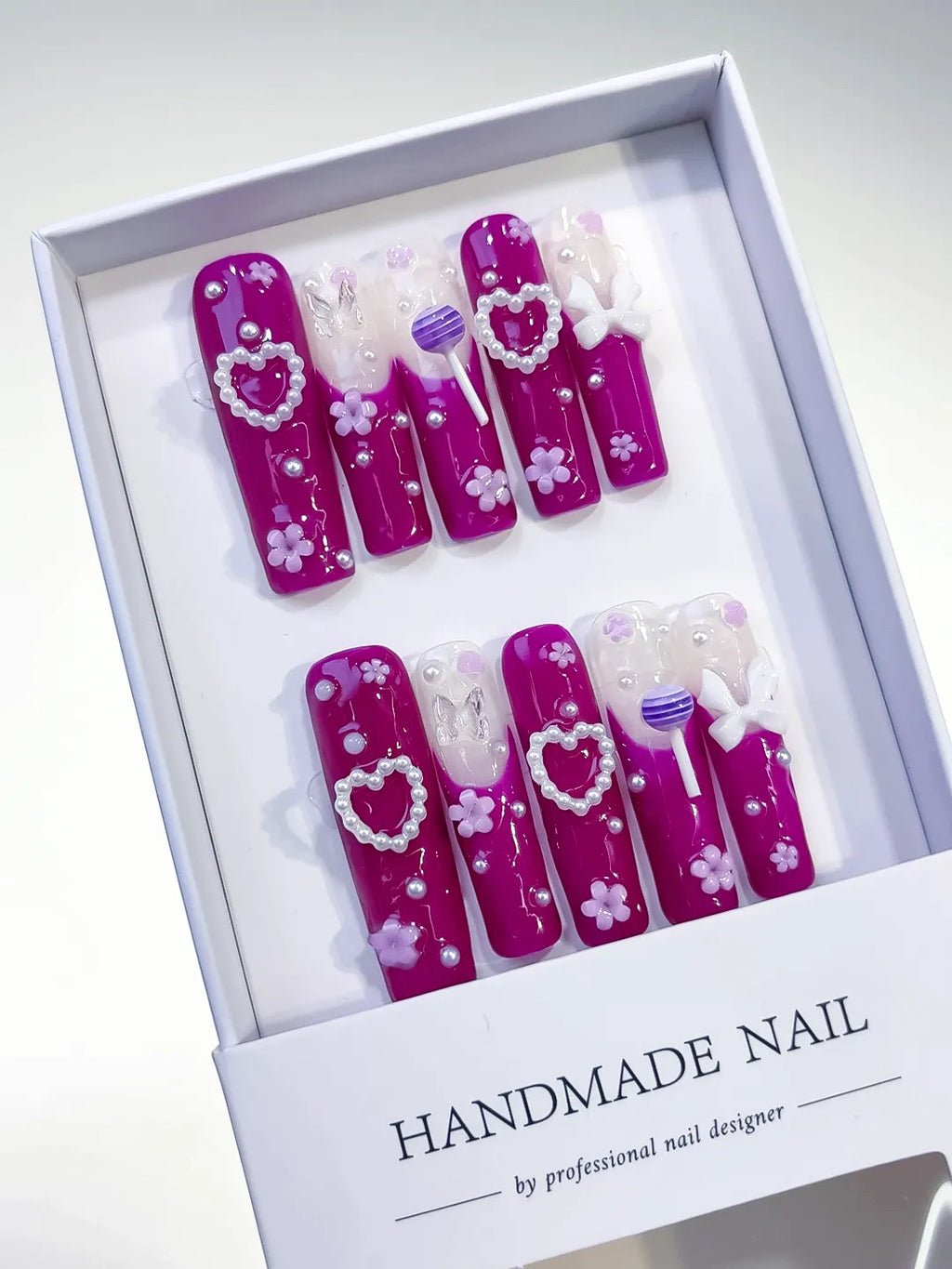 Pink White Purple Solid color Heart Bow Flower Pearl press on nails angled view