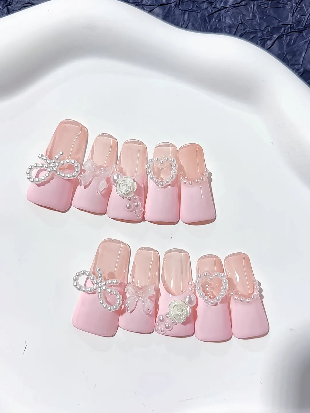 Pink Silver Solid color Bow Heart Flower press on nails close up