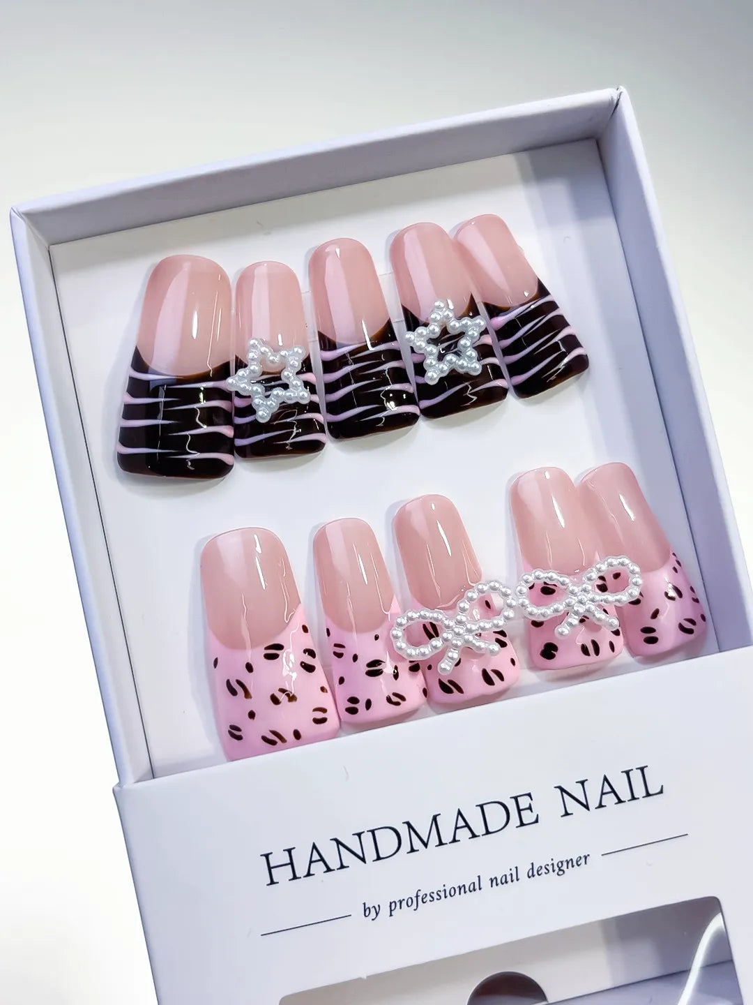Pink Brown Silver Abstract Bow Star Animal Print press on nails angled view