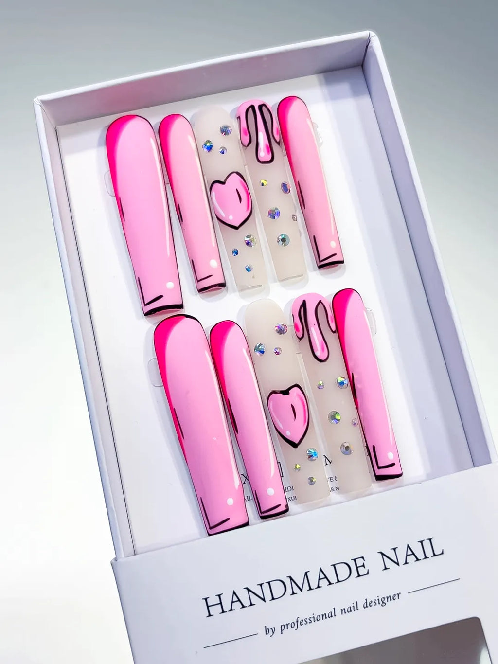 Pink Nude Black Abstract Heart Rhinestone press on nails angled view