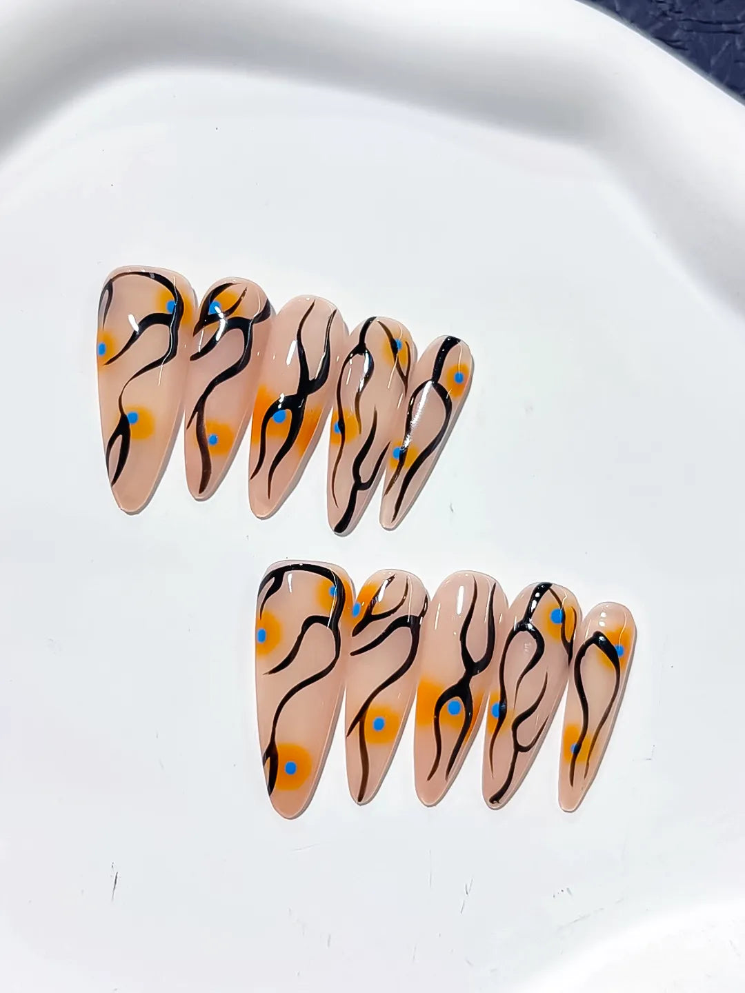 Nude Orange Black Blue Abstract Dot Pattern press on nails close up