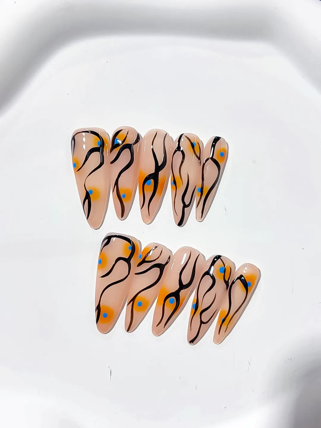 Nude Orange Black Blue Abstract Dot Pattern press on nails detail view