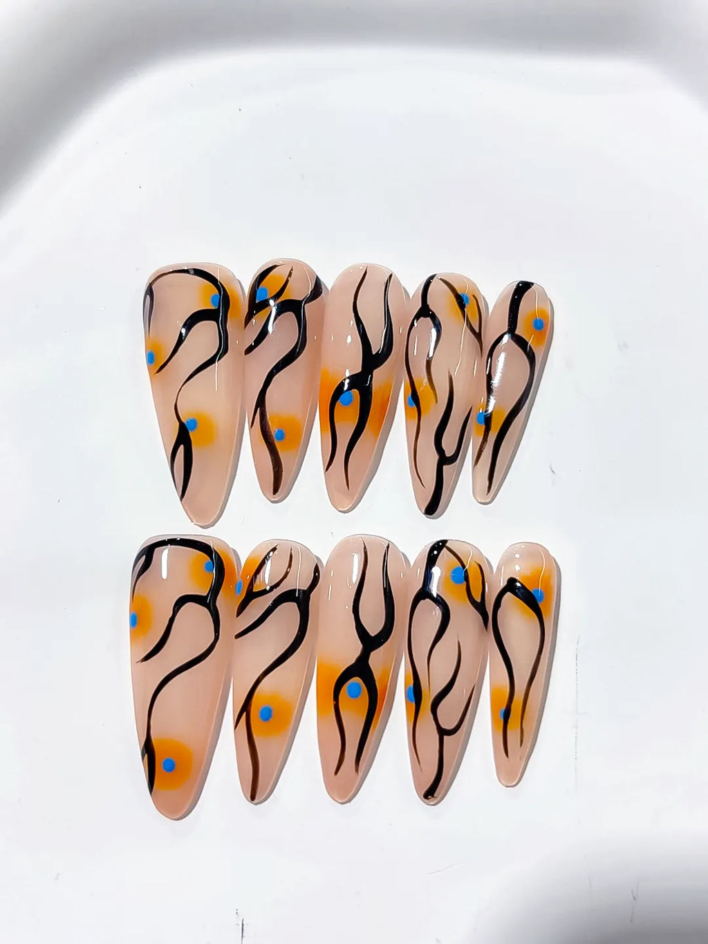 Nude Orange Black Blue Abstract Dot Pattern press on nails detail view