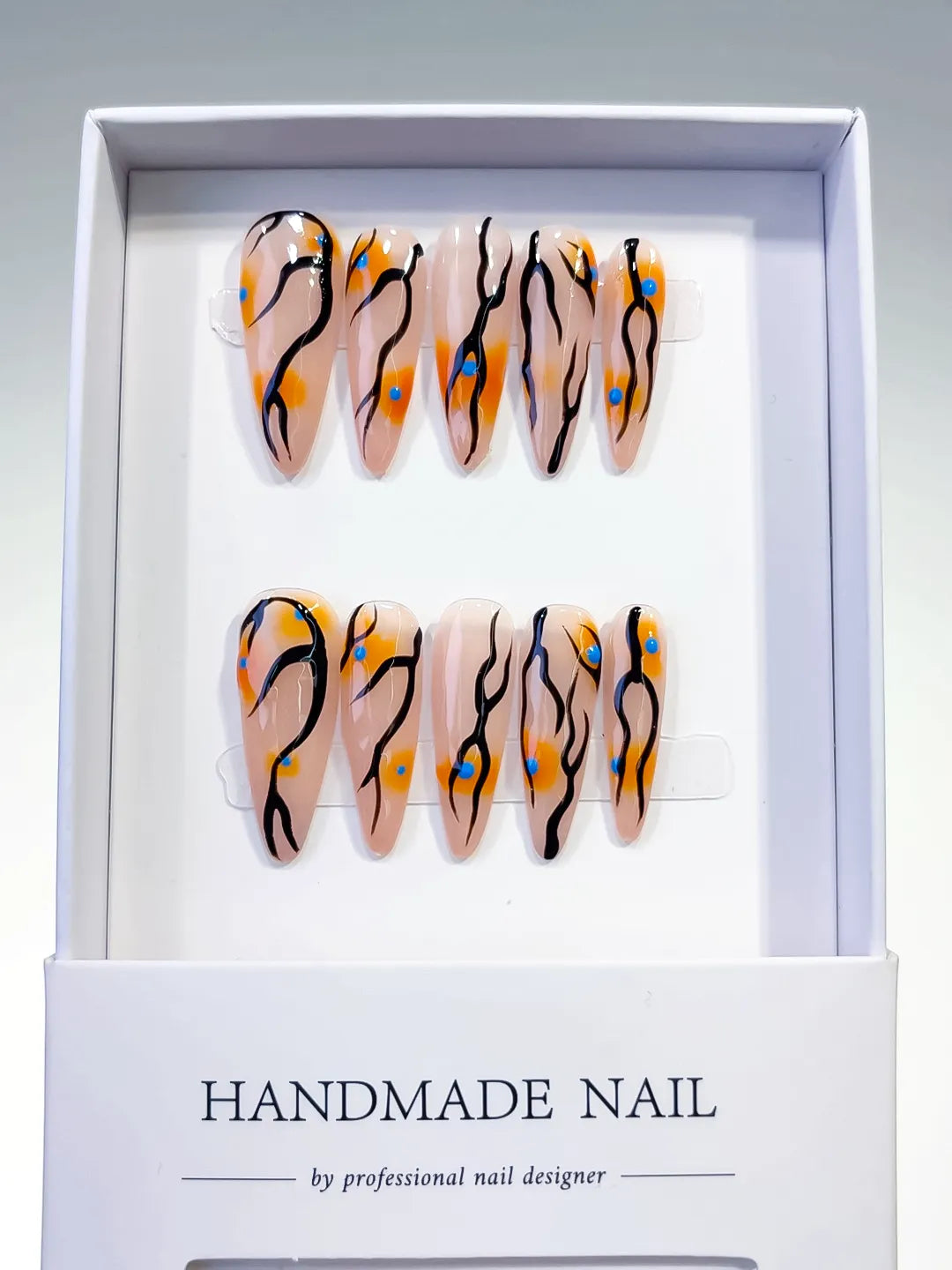 Nude Orange Black Blue Abstract Dot Pattern press on nails full set view