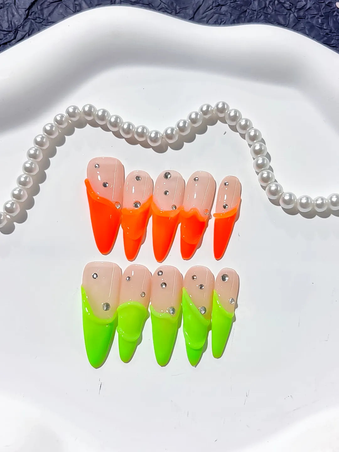 Nude Orange Green French tip Rhinestone press on nails detail view