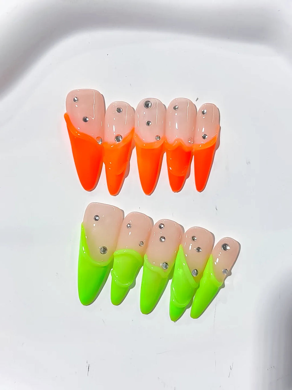 Nude Orange Green French tip Rhinestone press on nails detail view