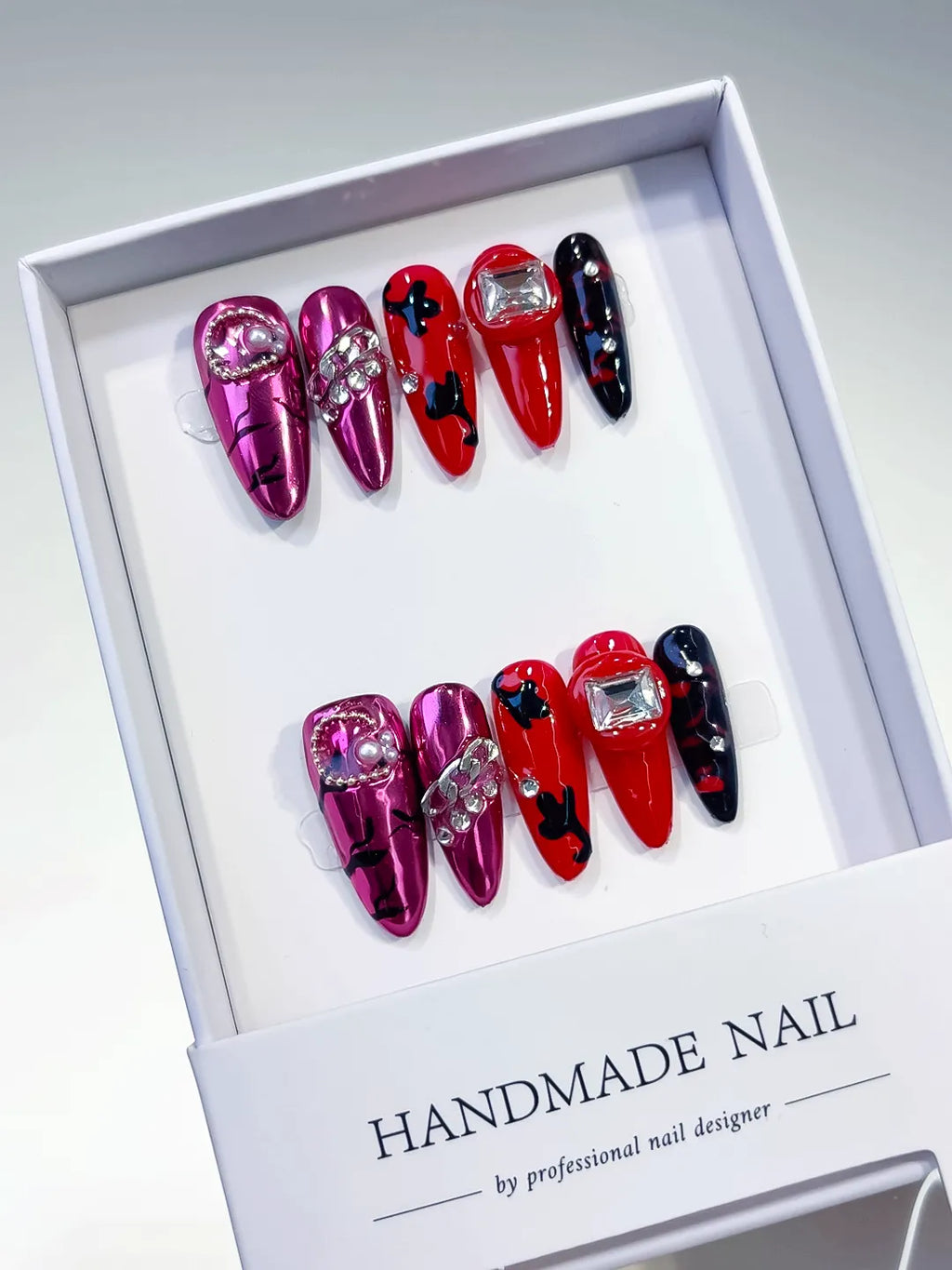 Pink Red Black Silver Metallic Bow Pearl Rhinestone press on nails angled view