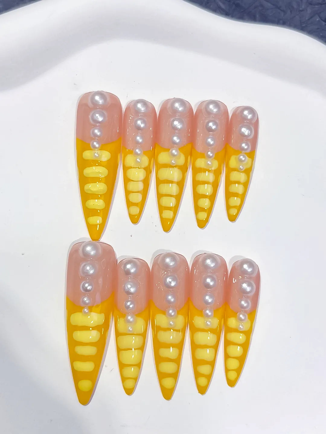 Nude Yellow White French tip Pearl press on nails detail view