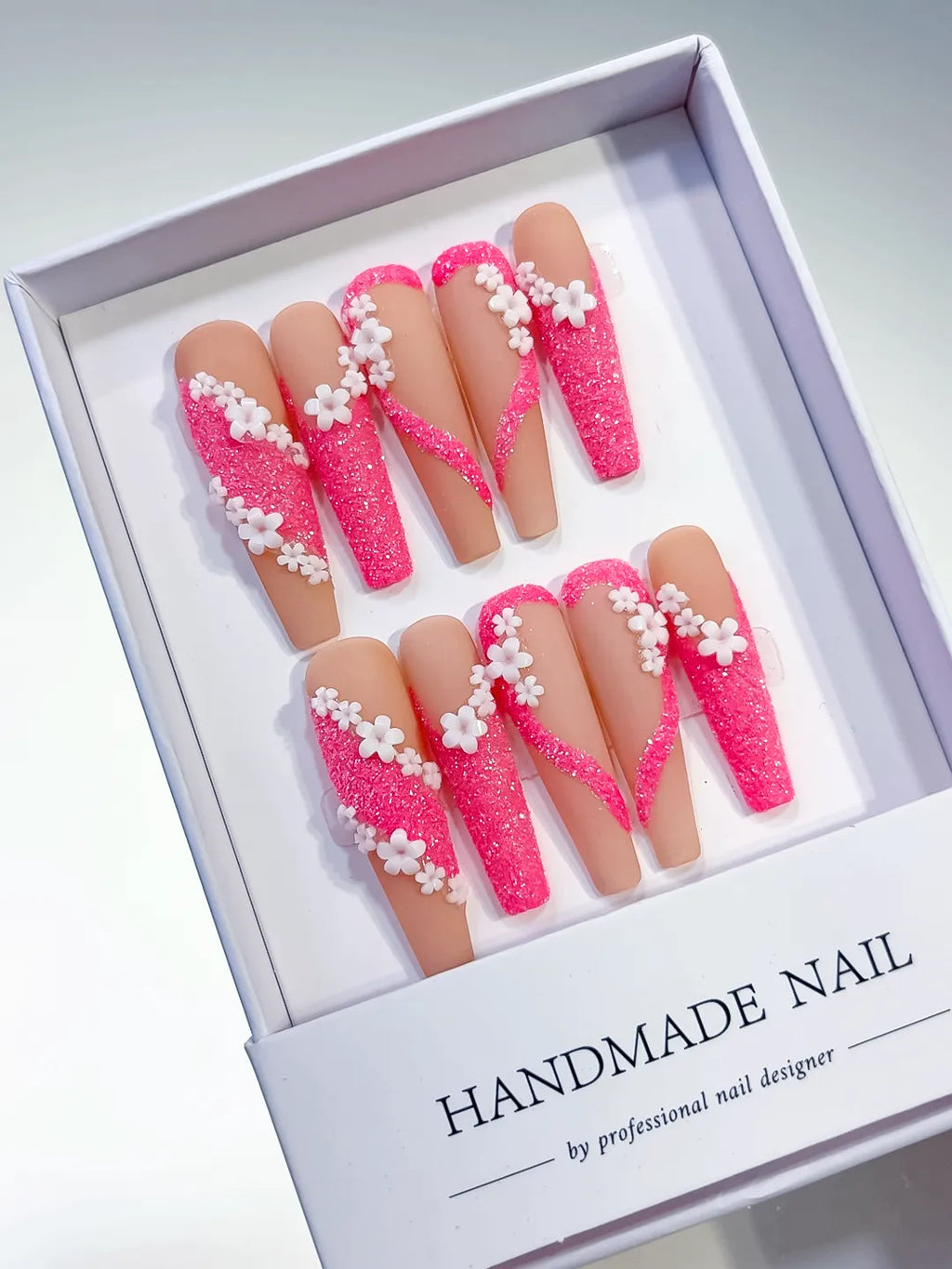 Nude Pink White Glitter Flower 3D press on nails angled view