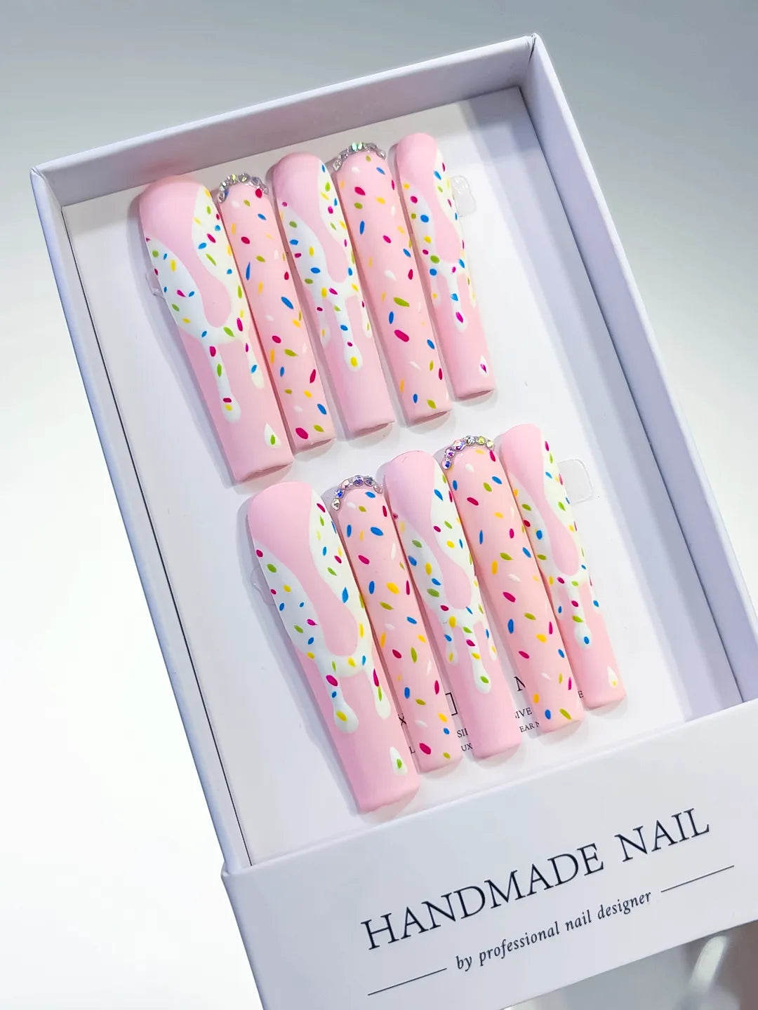 Pink White Yellow Blue Green Abstract Dot Pattern Rhinestone press on nails angled view