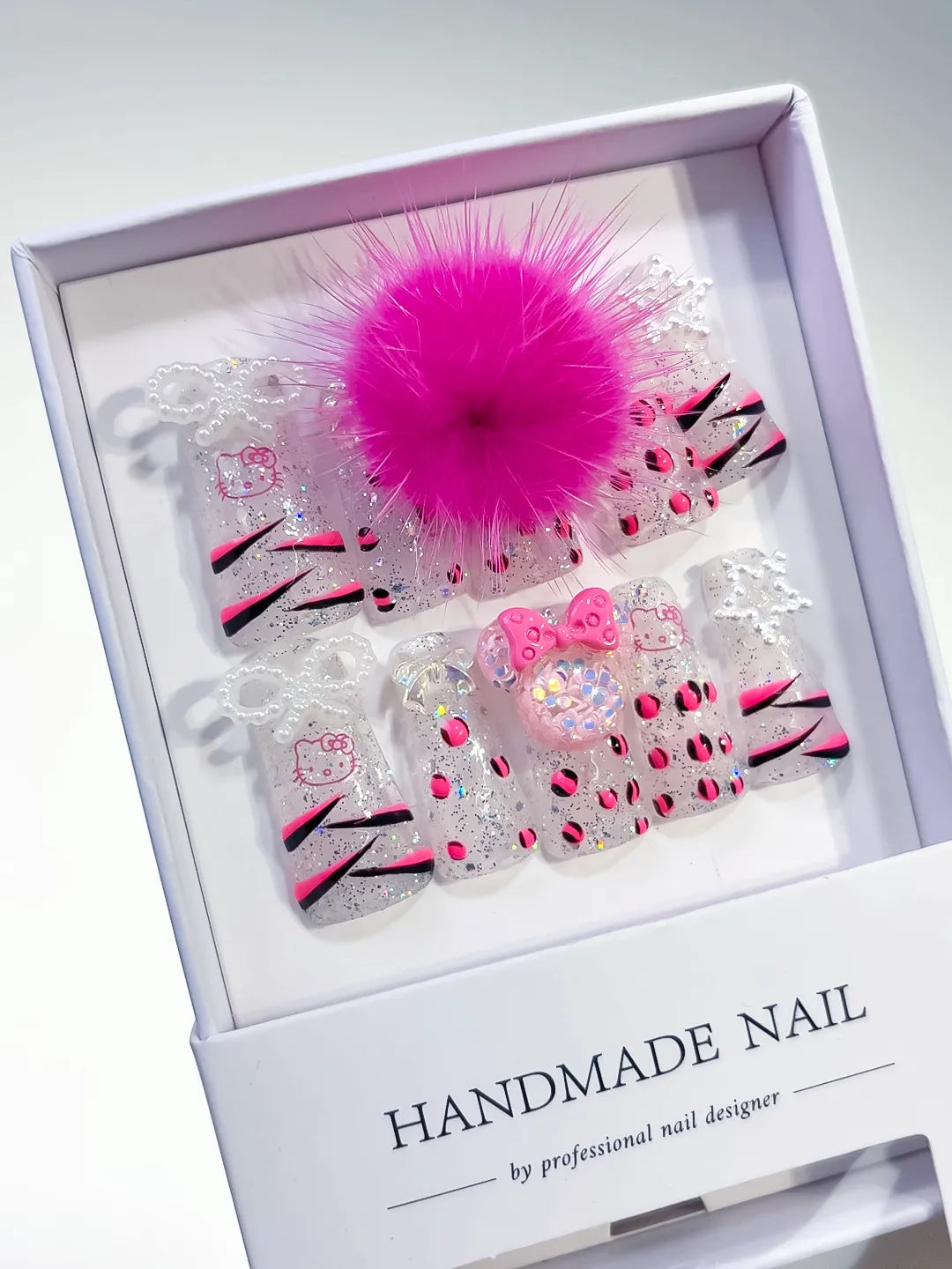White Pink Black Silver Glitter Hello Kitty Bow Rhinestone 3D press on nails angled view