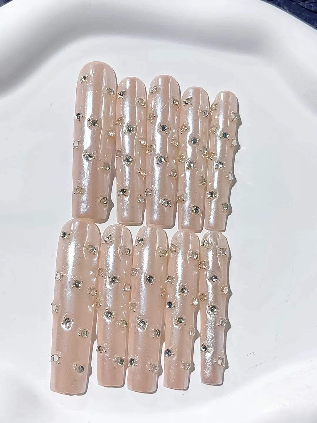 Nude White Silver Holographic Rhinestone press on nails close up