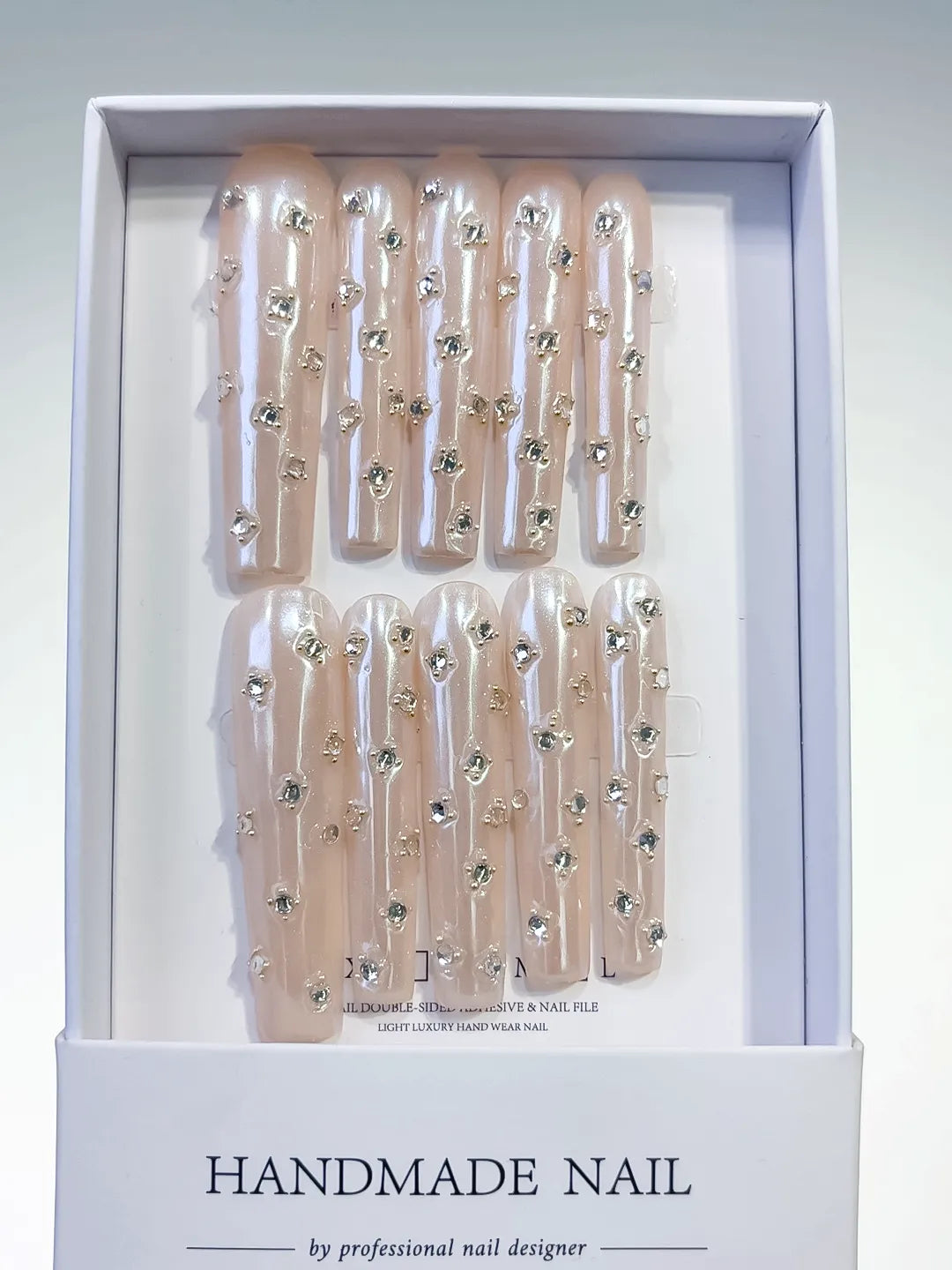 Nude White Silver Holographic Rhinestone press on nails full set view