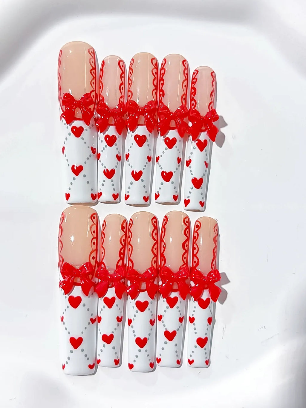 Nude White Red French tip Bow Heart 3D press on nails detail view