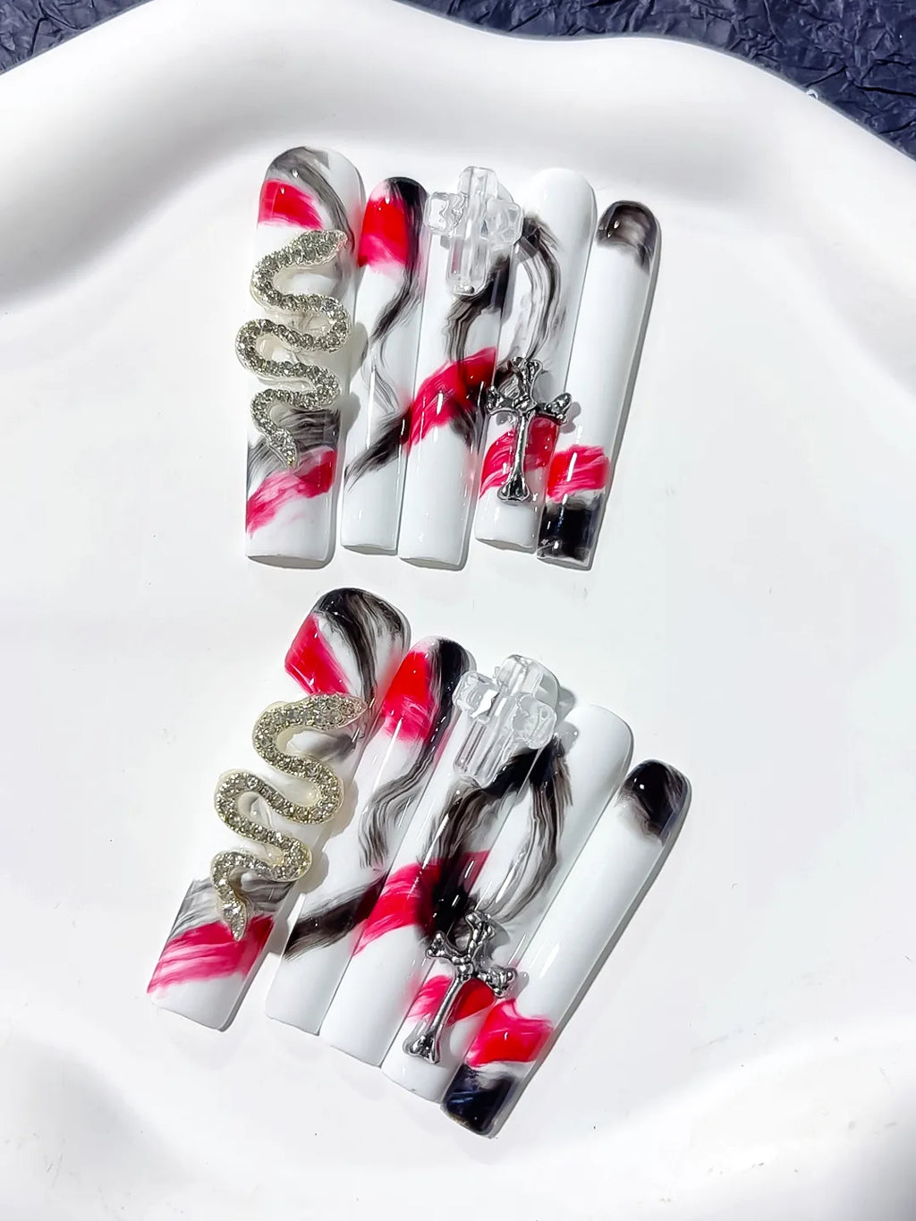 White Black Pink Silver Gold Abstract Cross Snake Metallic Charm press on nails close up