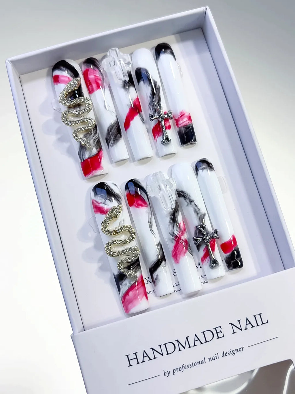 White Black Pink Silver Gold Abstract Cross Snake Metallic Charm press on nails angled view