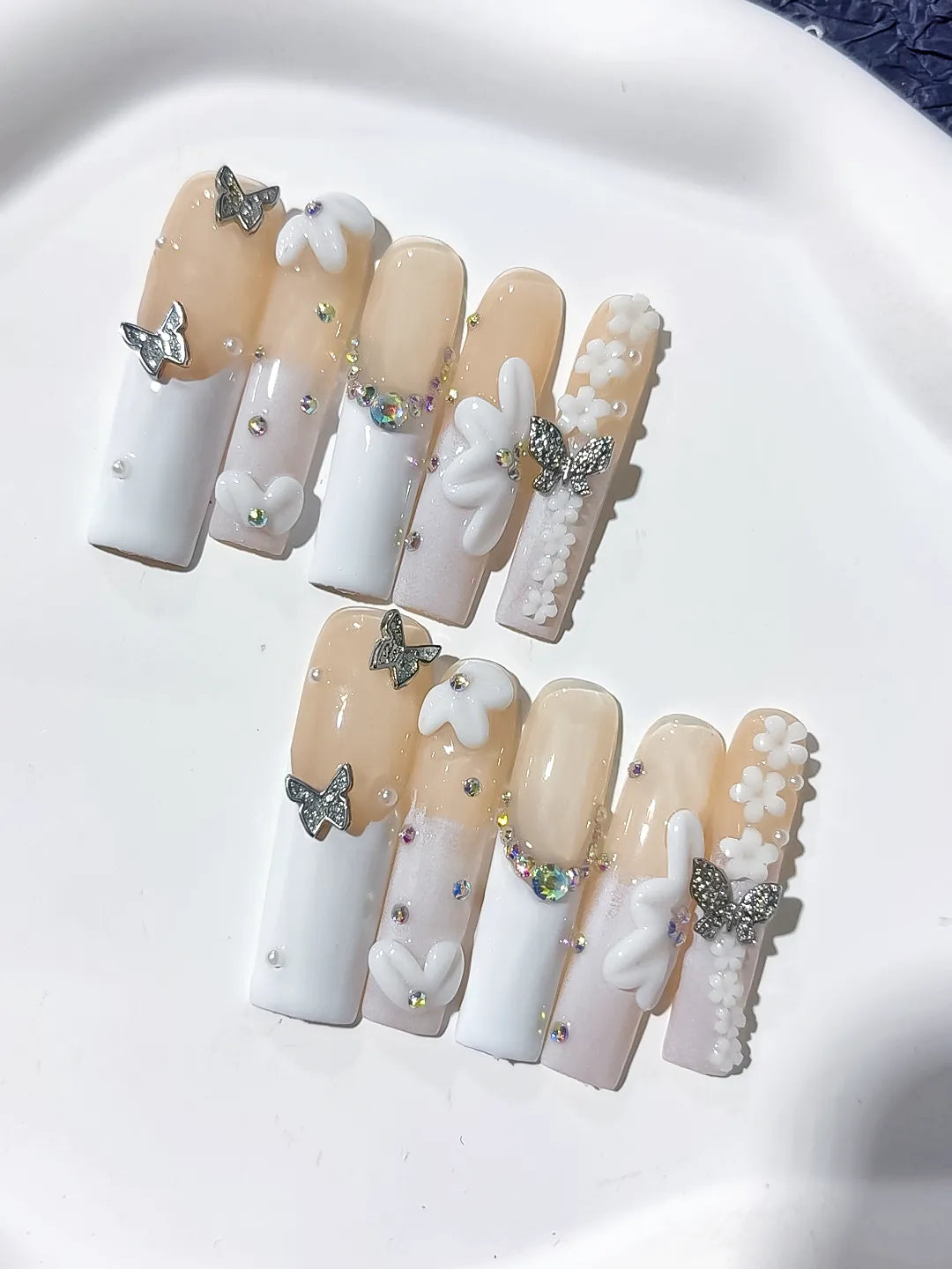 Nude White Silver Gold French tip Bow Pearl Rhinestone press on nails detail view