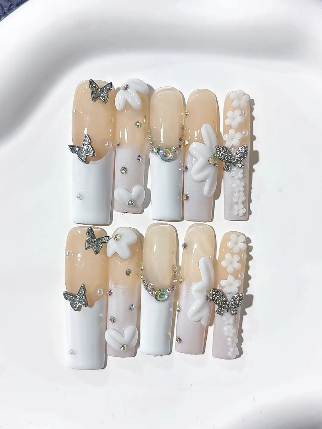 Nude White Silver Gold French tip Bow Pearl Rhinestone press on nails detail view