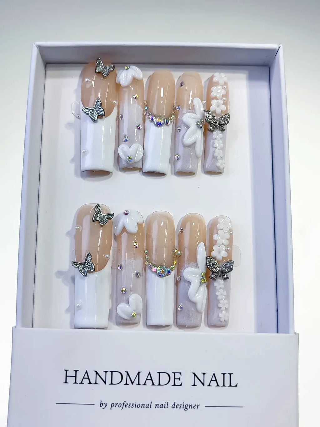 Nude White Silver Gold French tip Bow Pearl Rhinestone press on nails full set view