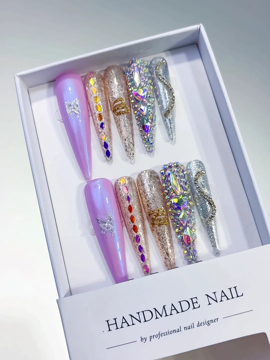Purple Gold Silver Multicolor Glitter Butterfly Rhinestone 3D press on nails angled view