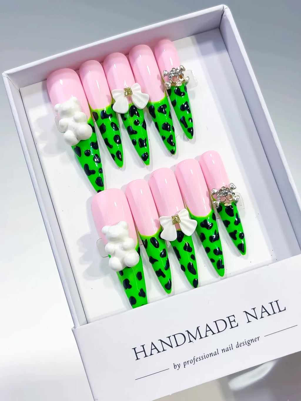 Pink Green White French tip Flower press on nails angled view