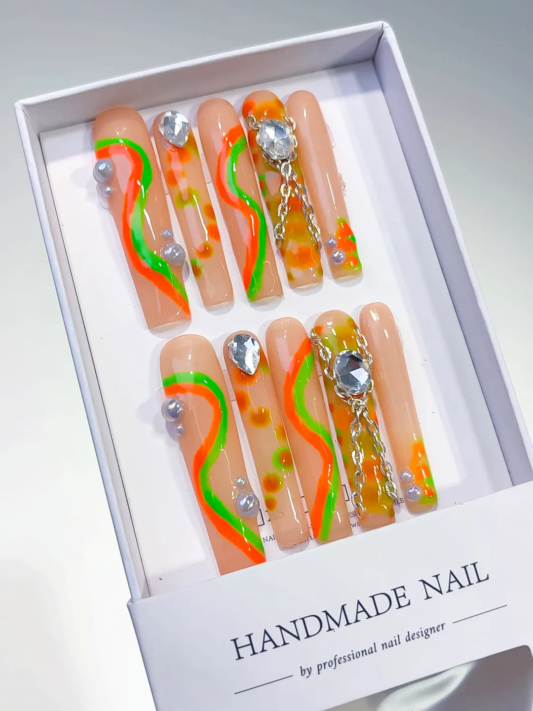 Nude Orange Green Yellow Silver Abstract Chain Rhinestone press on nails angled view