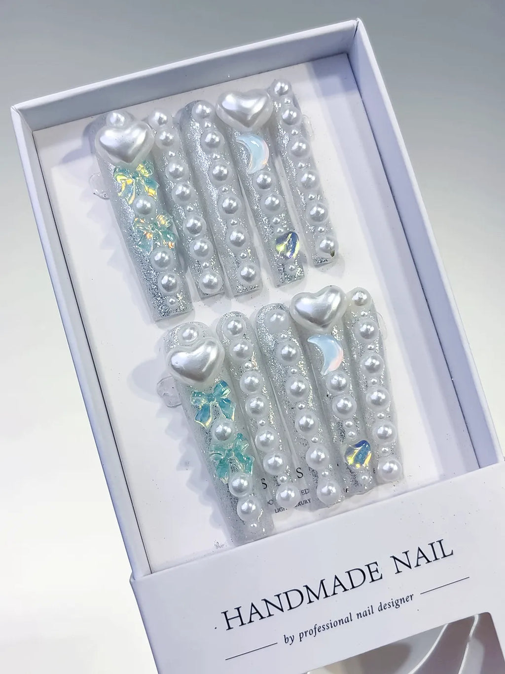 White Multicolor Silver Holographic Heart Rhinestone press on nails angled view