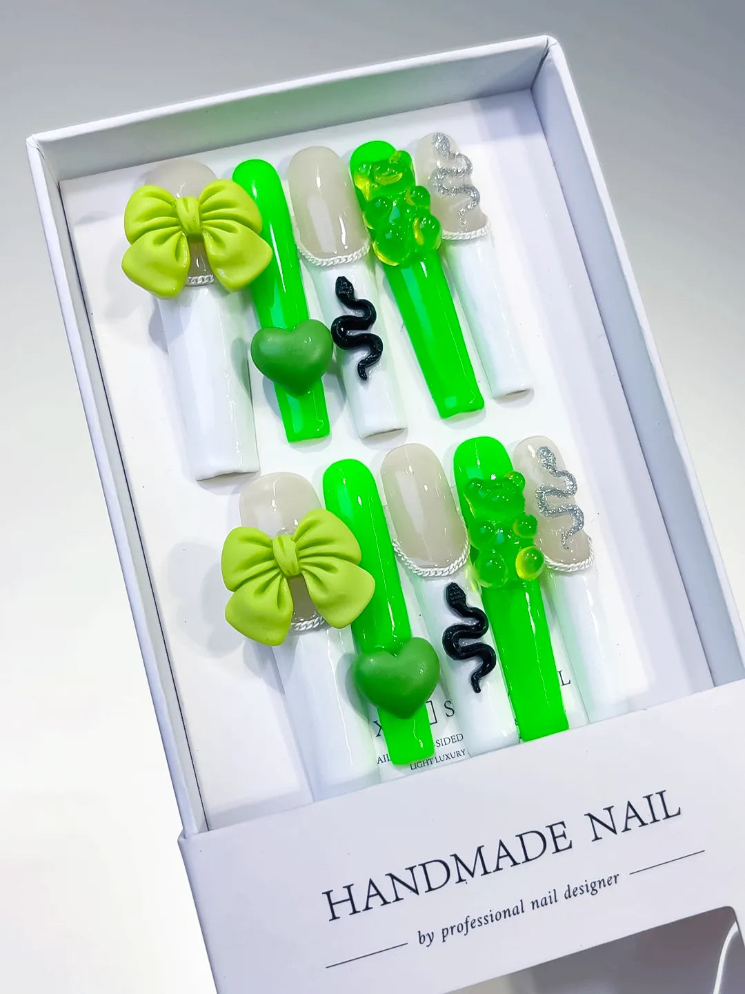 White Green Black Silver Solid color Bow Heart Gummy Bear Snake 3D press on nails angled view
