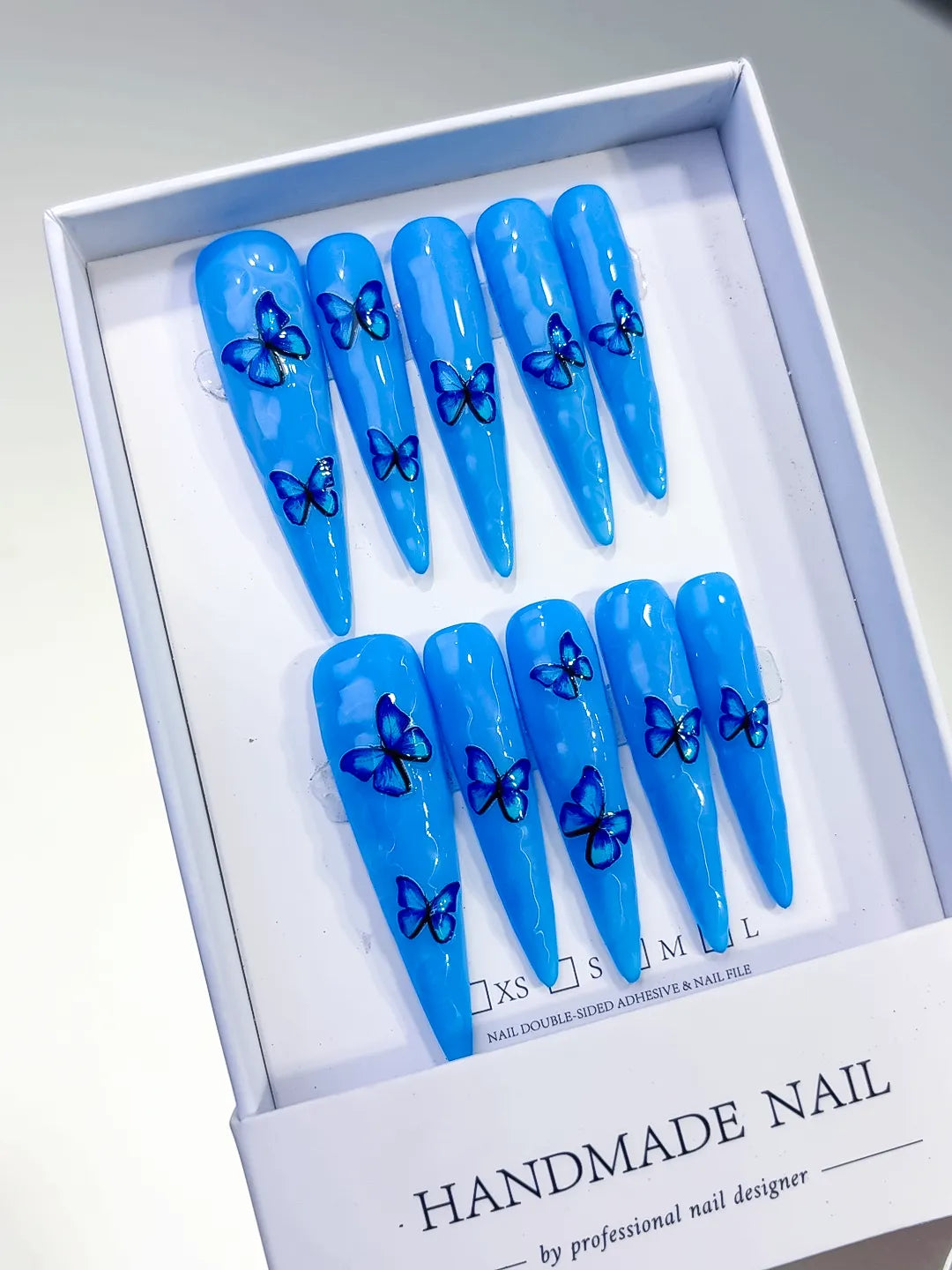 Blue Silver Metallic Rhinestone press on nails angled view