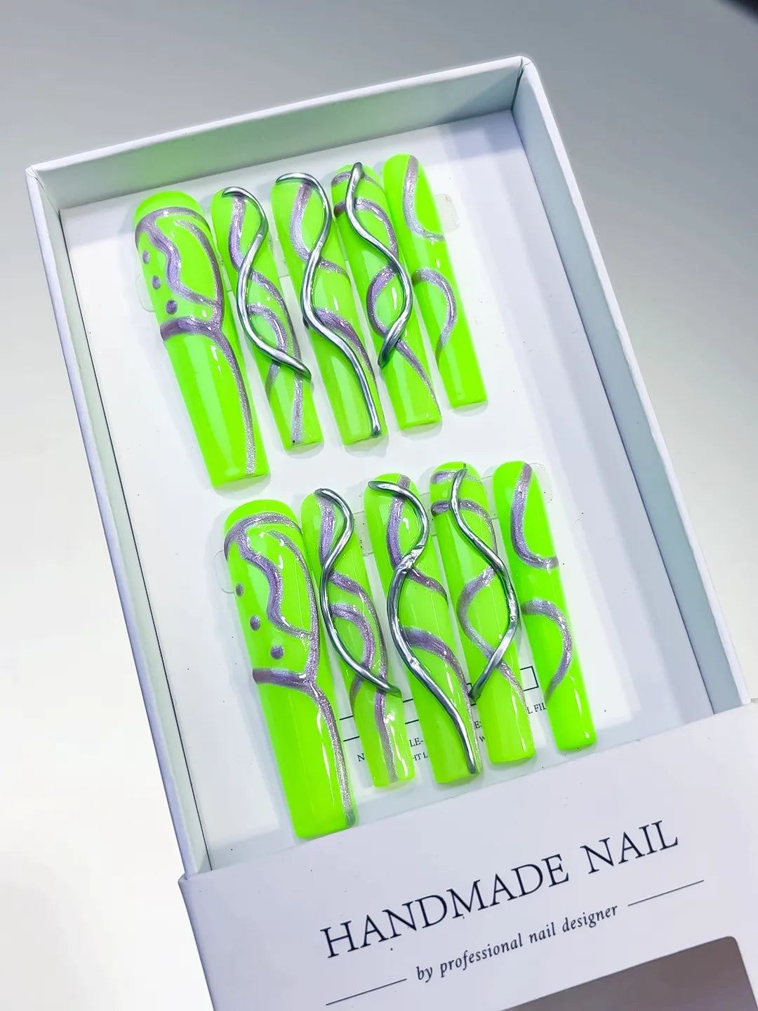 Green White Silver Abstract Swirl press on nails angled view