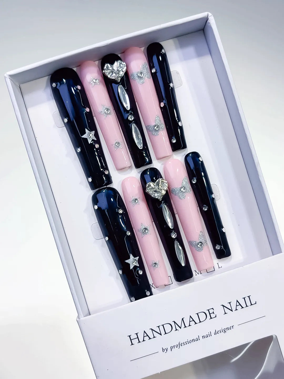 Black Pink Silver Solid color Star Bow Rhinestone press on nails angled view