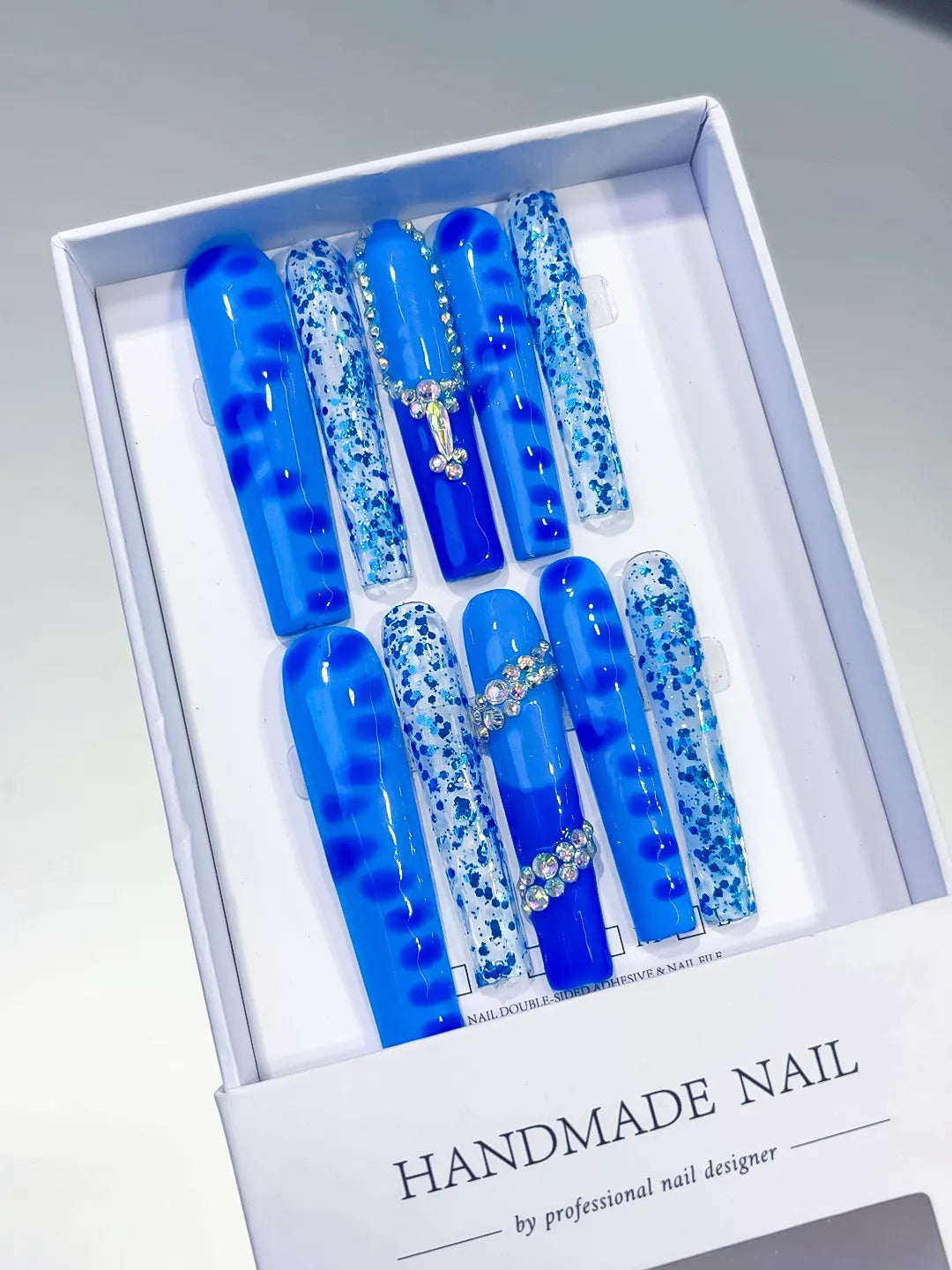 Blue White Silver Glitter Cross Rhinestone press on nails angled view