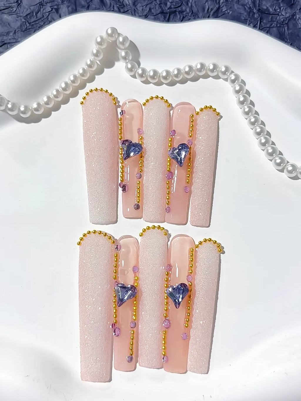 Nude White Gold Purple Glitter Heart Rhinestone Pearl press on nails detail view