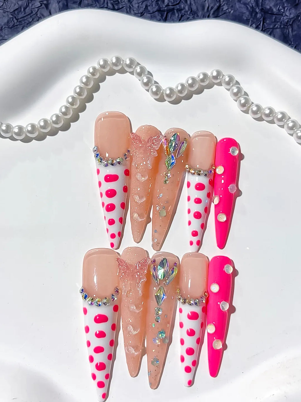 Nude White Pink Silver Abstract Dot Pattern Bow Rhinestone 3D press on nails detail view