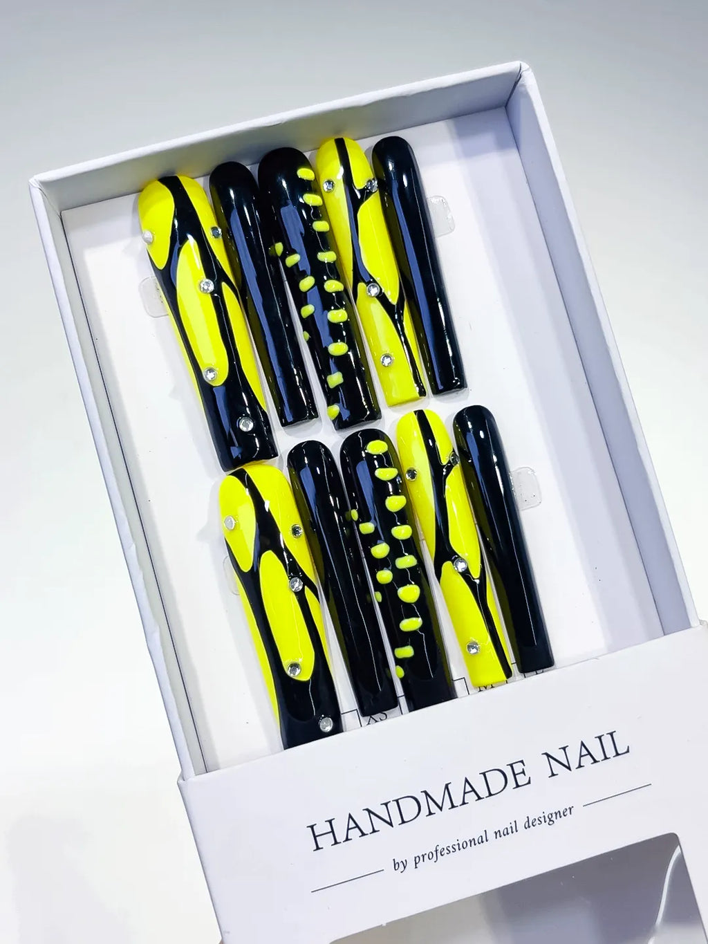 Black Yellow Silver Abstract Rhinestone press on nails angled view