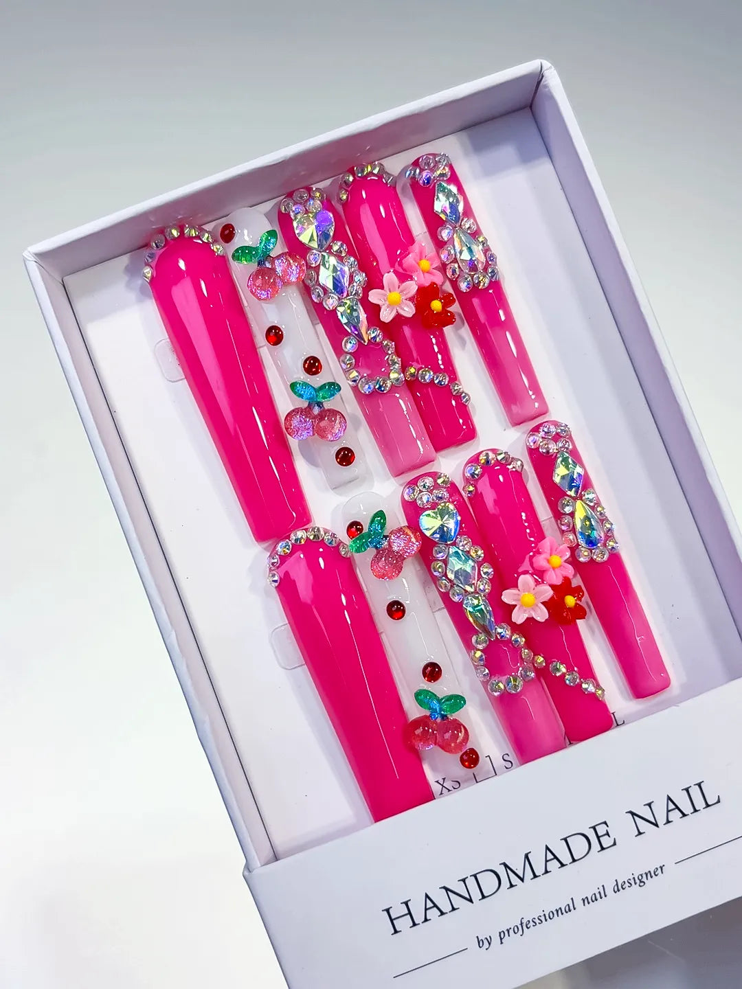 Pink Red Green Yellow Silver Solid color Cherry Flower Rhinestone press on nails angled view