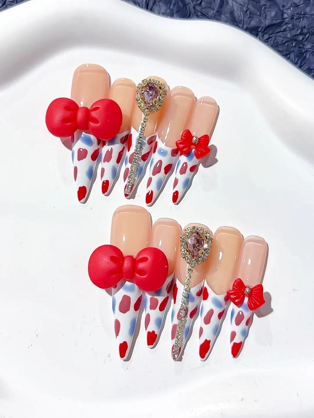 Nude White Red Blue Silver Abstract Bow Heart Rhinestone 3D press on nails detail view