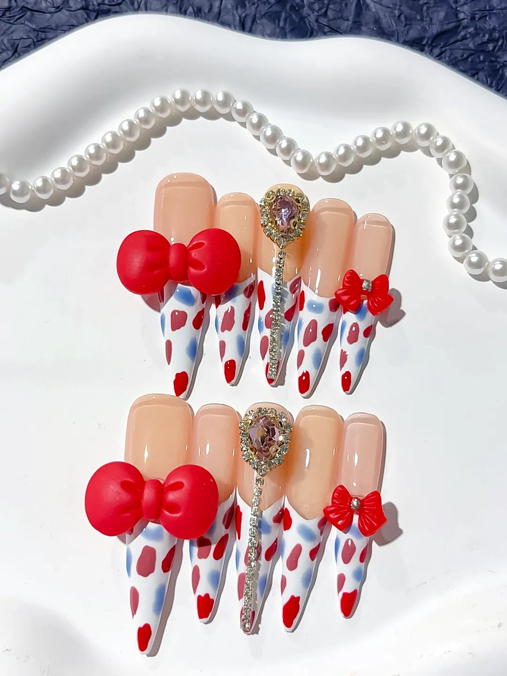 Nude White Red Blue Silver Abstract Bow Heart Rhinestone 3D press on nails detail view
