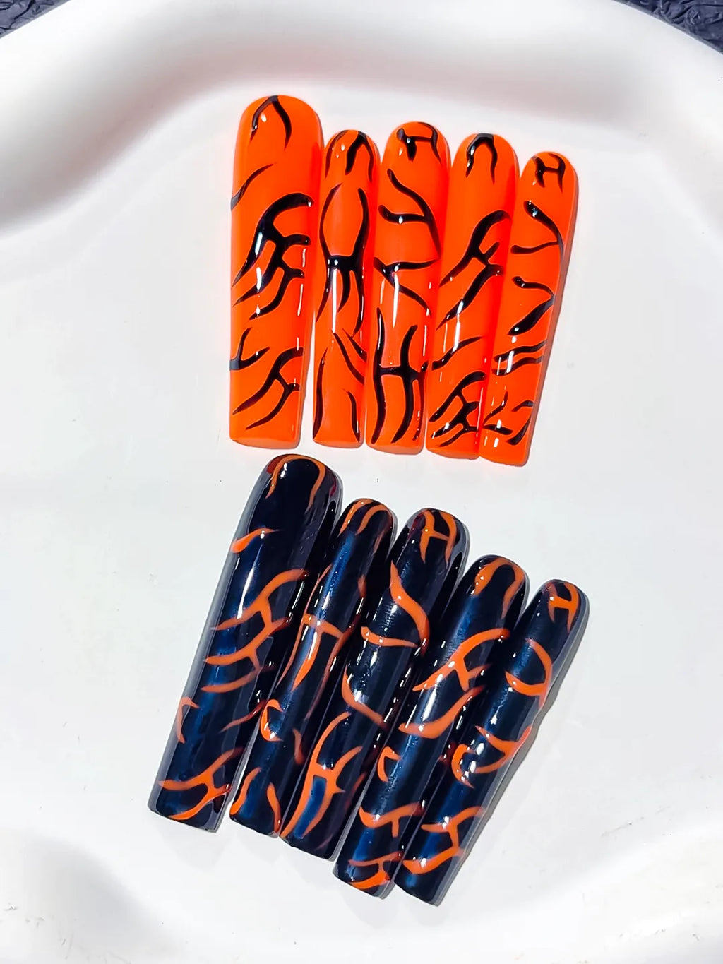 Orange Black Abstract press on nails close up