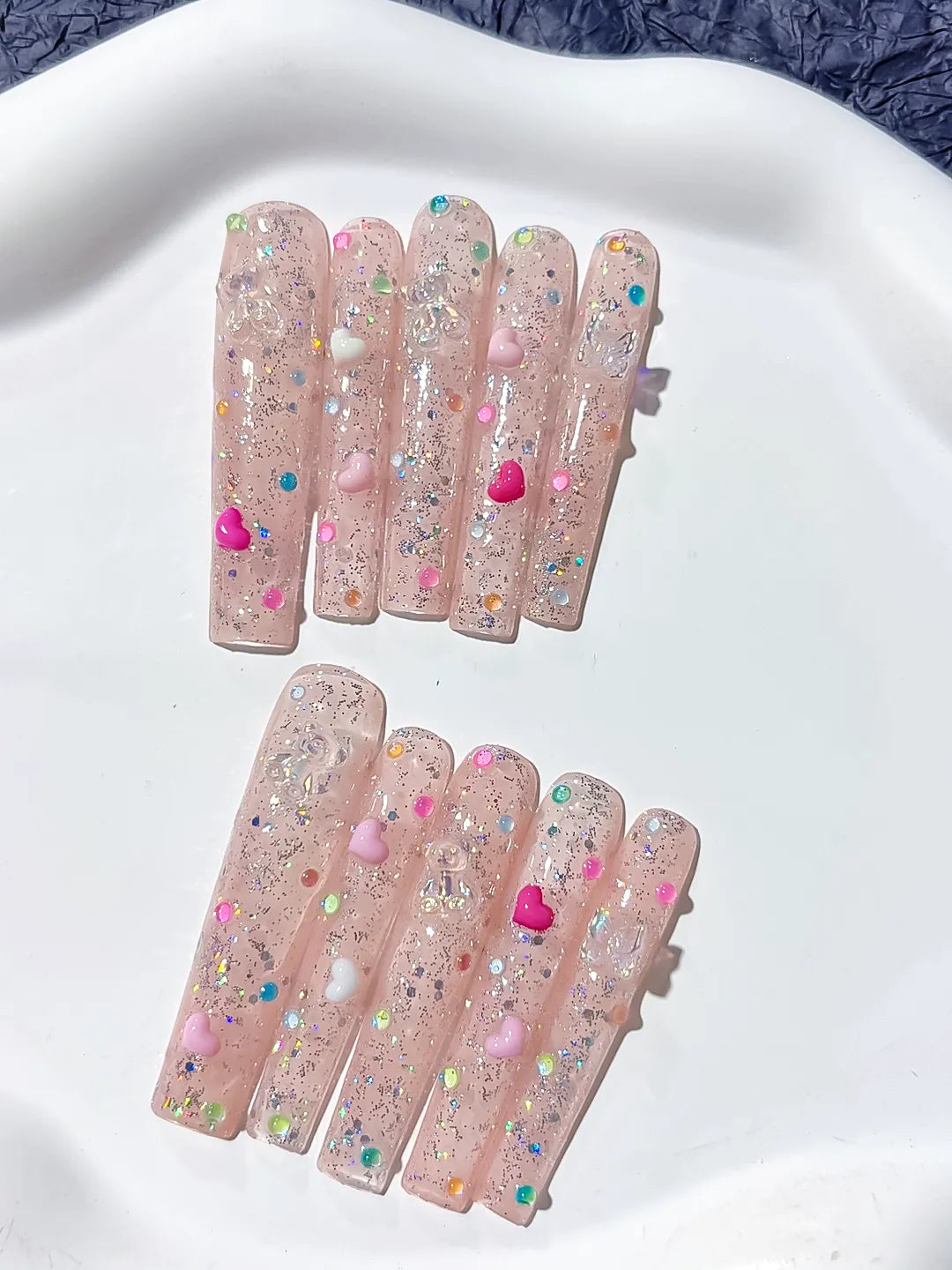 Nude Pink Silver Glitter Heart Pearl 3D press on nails close up