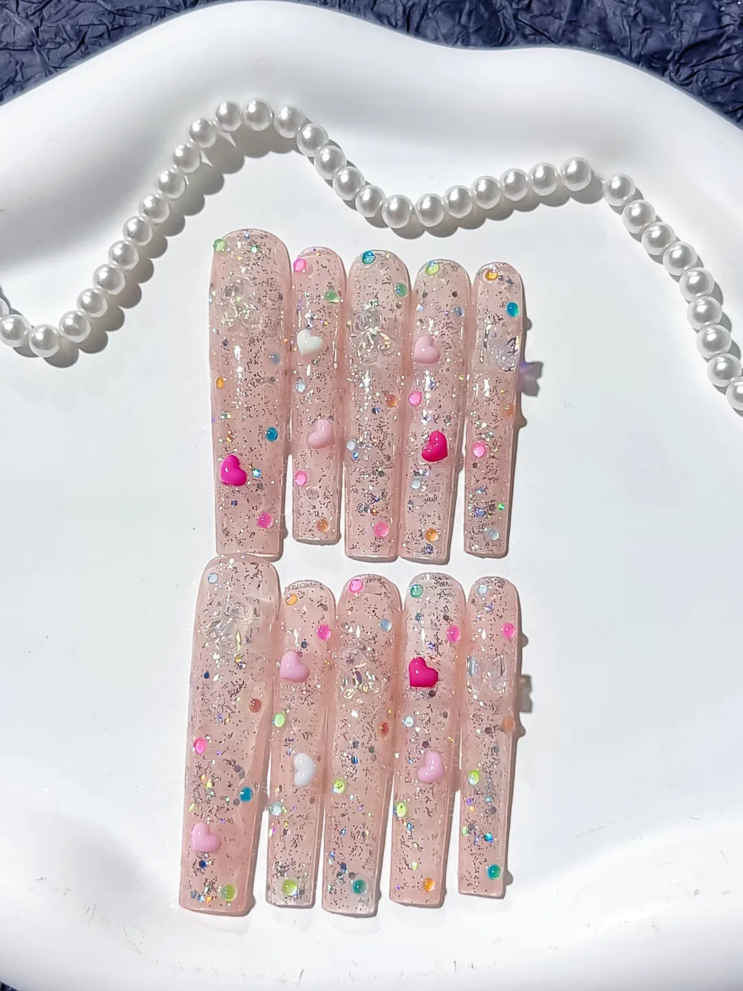 Nude Pink Silver Glitter Heart Pearl 3D press on nails detail view