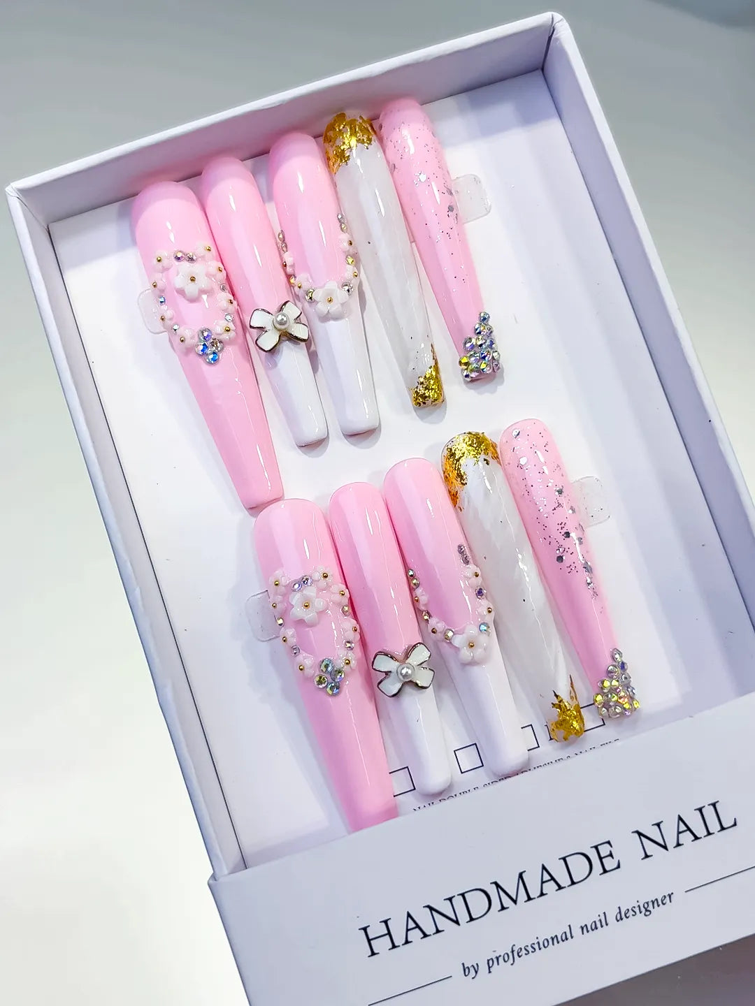 Pink White Gold Silver Solid color Bow Flower Rhinestone Glitter press on nails angled view