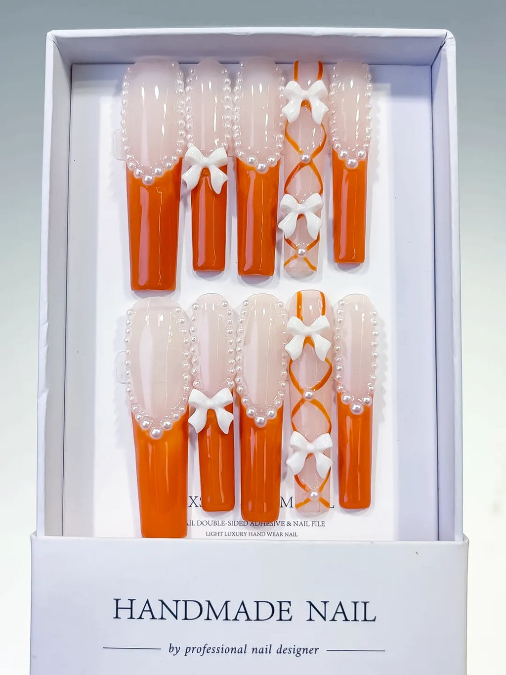 Nude Orange White Silver French tip Bow Pearl 3D press on nails full set view