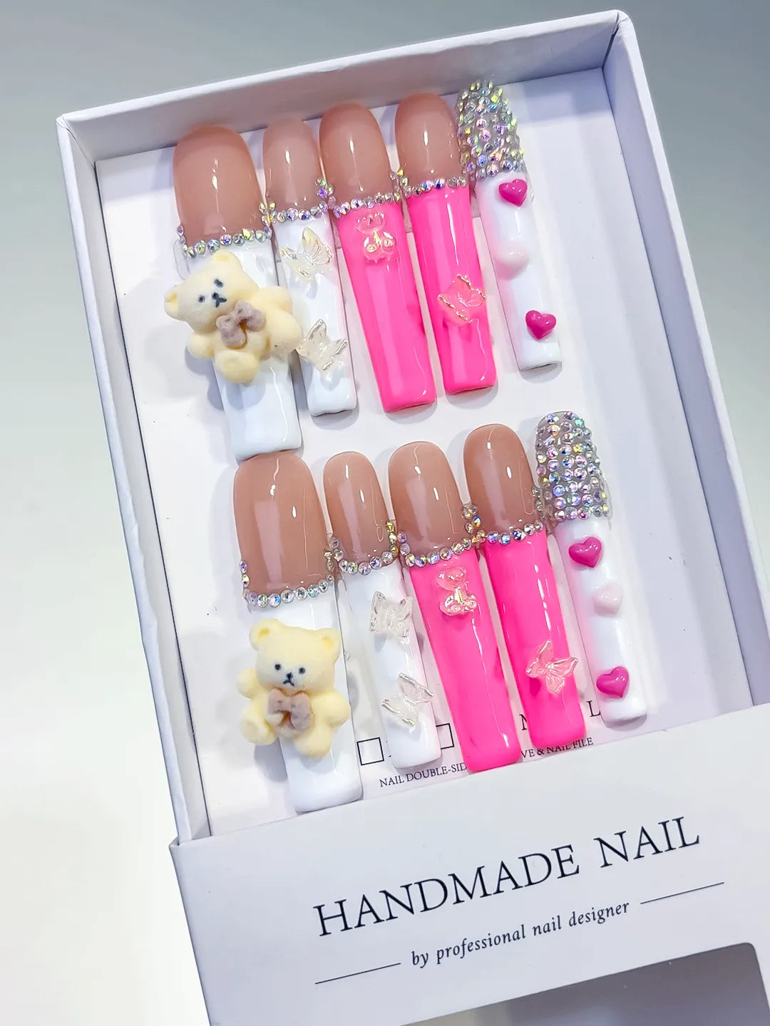 Nude White Pink Silver Solid color Bear Butterfly Heart Rhinestone 3D press on nails angled view