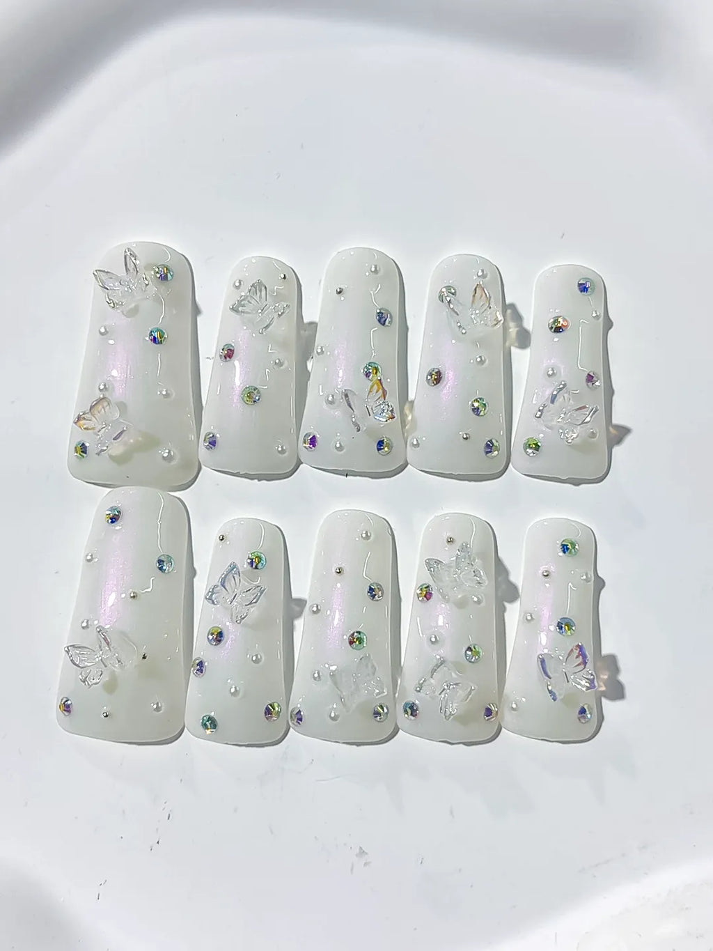 White Silver Multicolor Solid color Butterfly Pearl Rhinestone 3D press on nails detail view