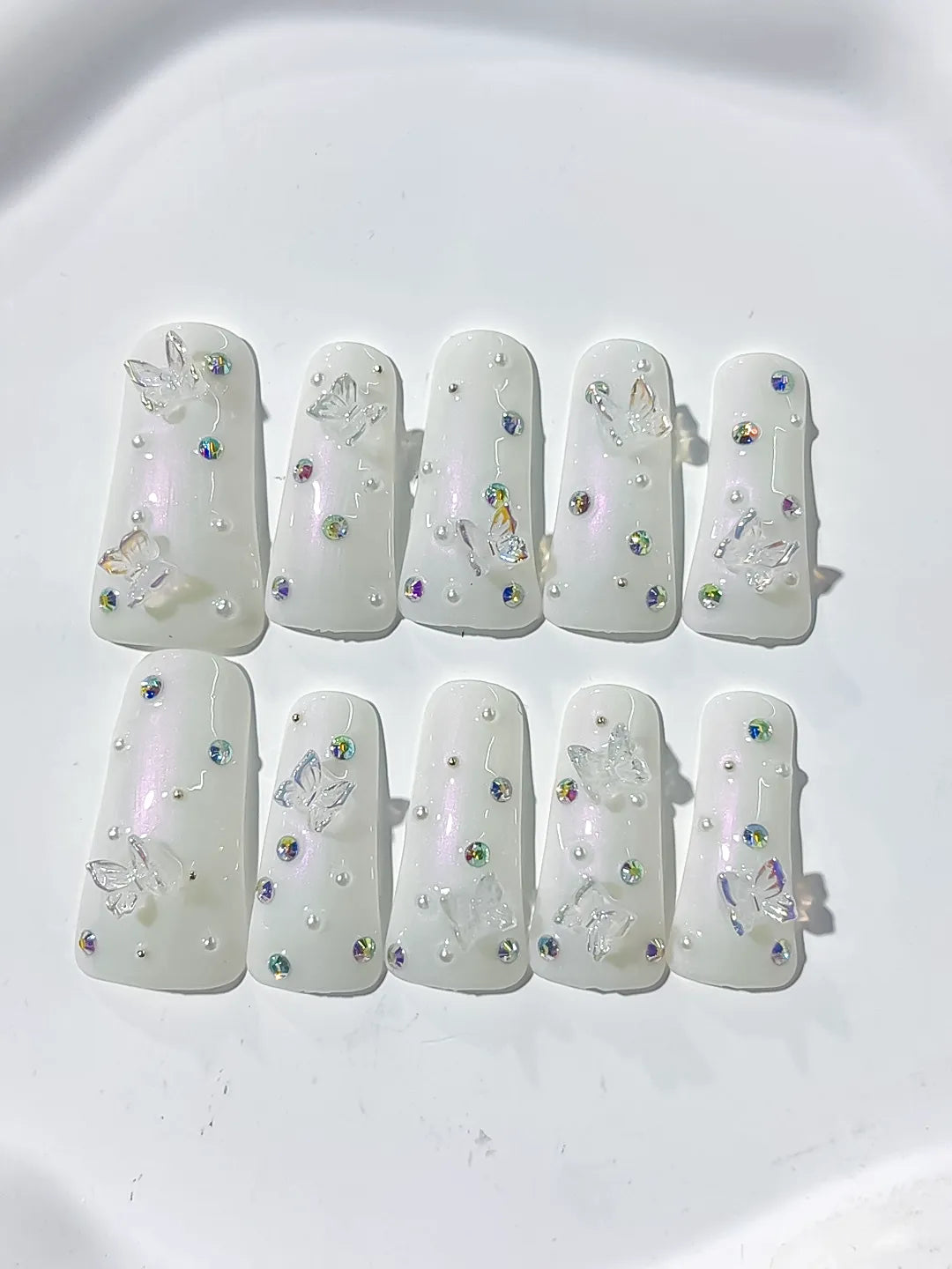 White Silver Multicolor Solid color Butterfly Pearl Rhinestone 3D press on nails detail view