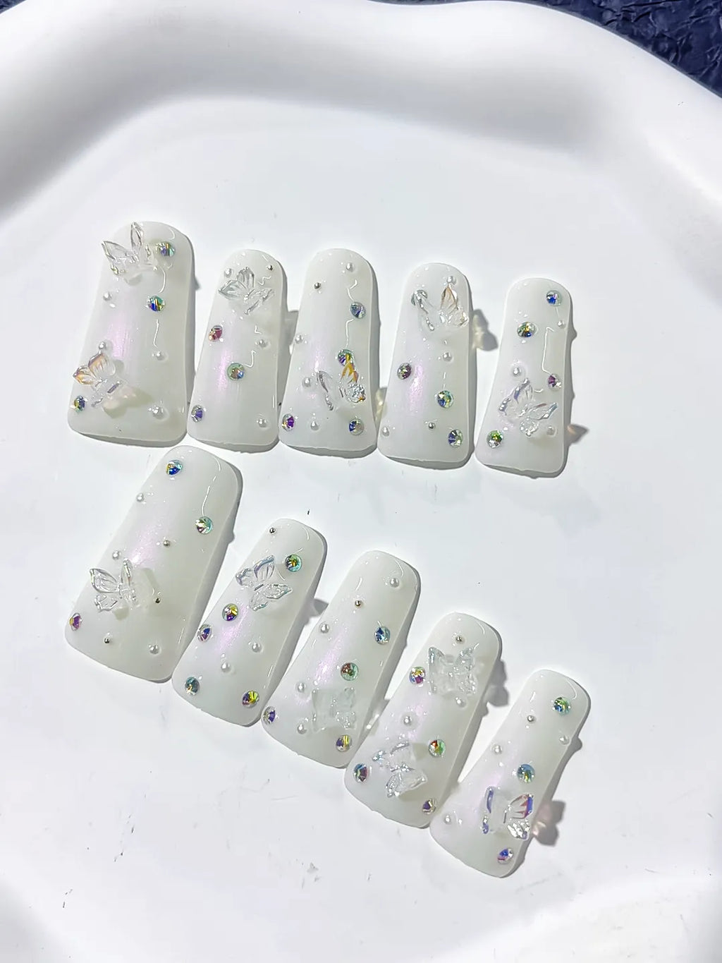 White Silver Multicolor Solid color Butterfly Pearl Rhinestone 3D press on nails detail view