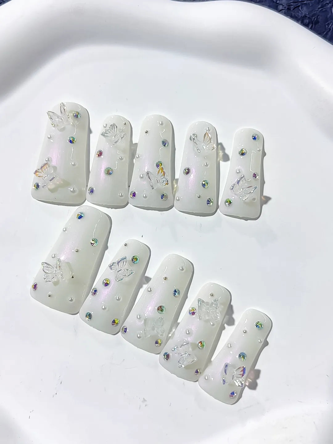 White Silver Multicolor Solid color Butterfly Pearl Rhinestone 3D press on nails detail view
